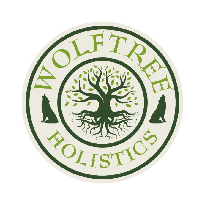 Wolftree Holistics Logo. A Tree of life surrounded by the words Wolftree Holistics and two wolf silhouettes 